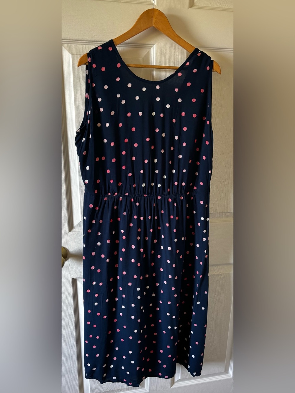 Sugarhill Brighton “Gloria” Navy Sleeveless Polka Dot Dress with tie back